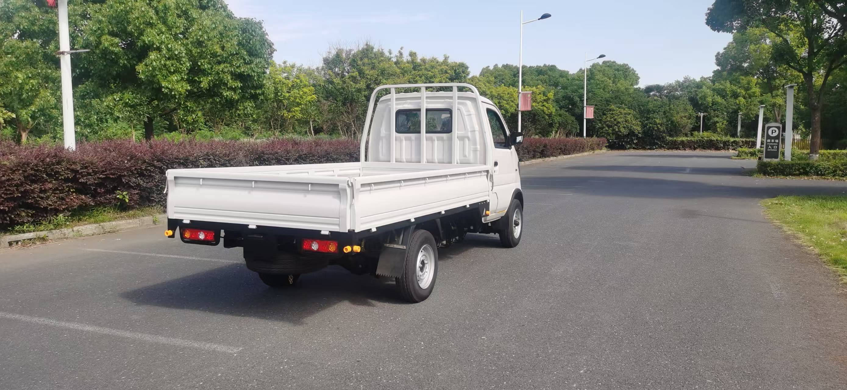 The KF1 EV from behind and to one side, showing the length of the bed