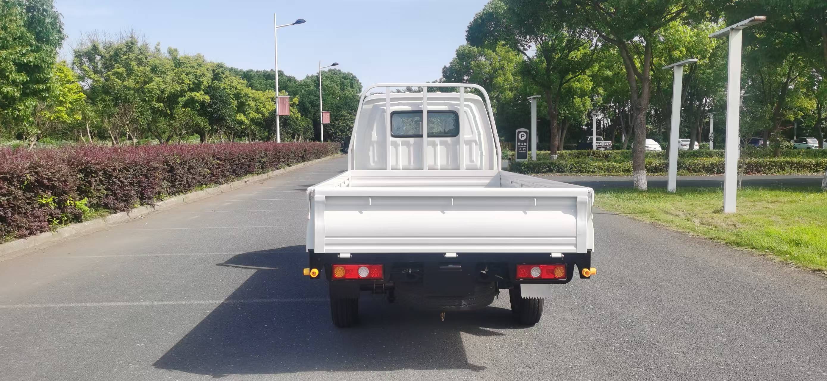 The KF1 EV square from behind, tailgate up